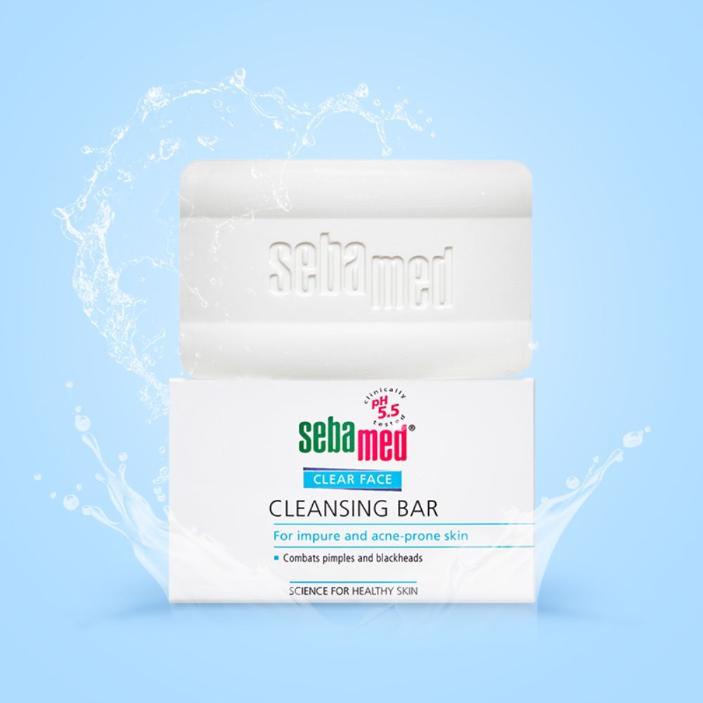 Lathered cleansing bar held in hand